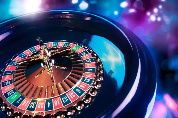 Live roulette table with dealer and players